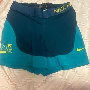Nike Women's Navy and Turquoise Athletic Shorts
